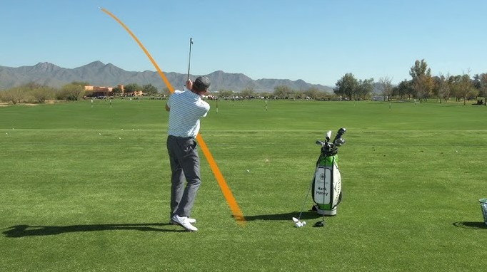 why does my golf ball go to the left